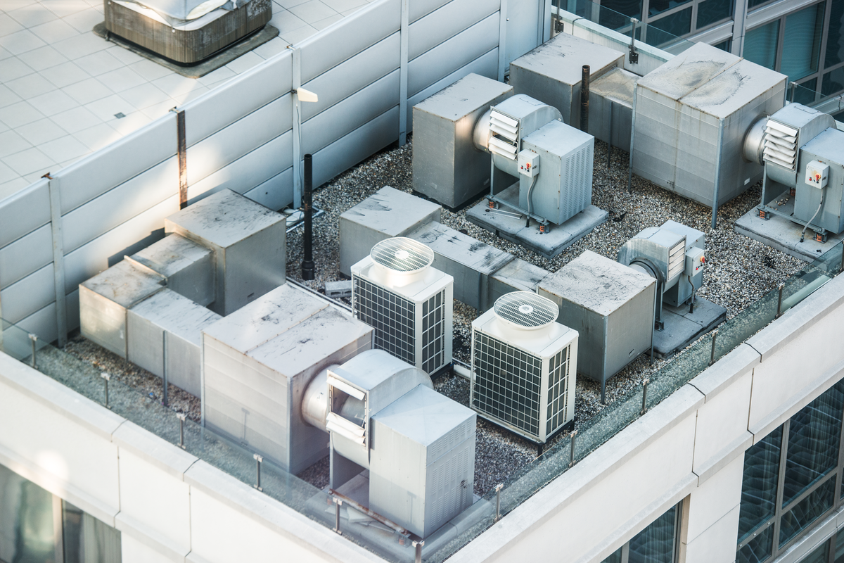 Birds-eye view of HVAC system on top of commercial building.