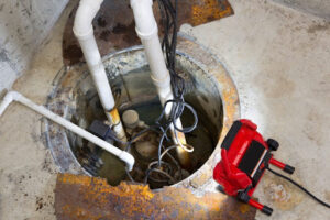 A light shining on a sump pump.