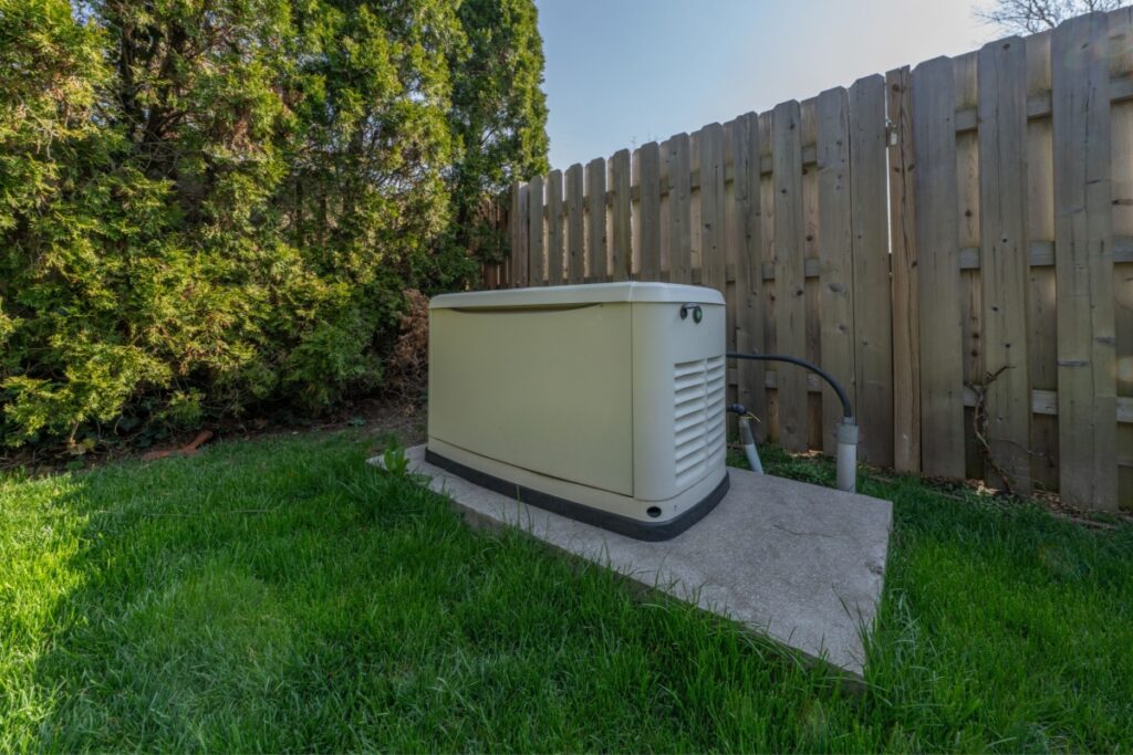A generator in a yard.